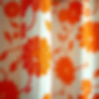 Material close-up showcasing the texture of an orange floral shower curtain