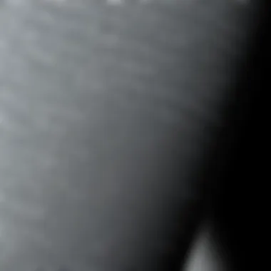 Close-up of fabric texture of grey bootcut yoga pants