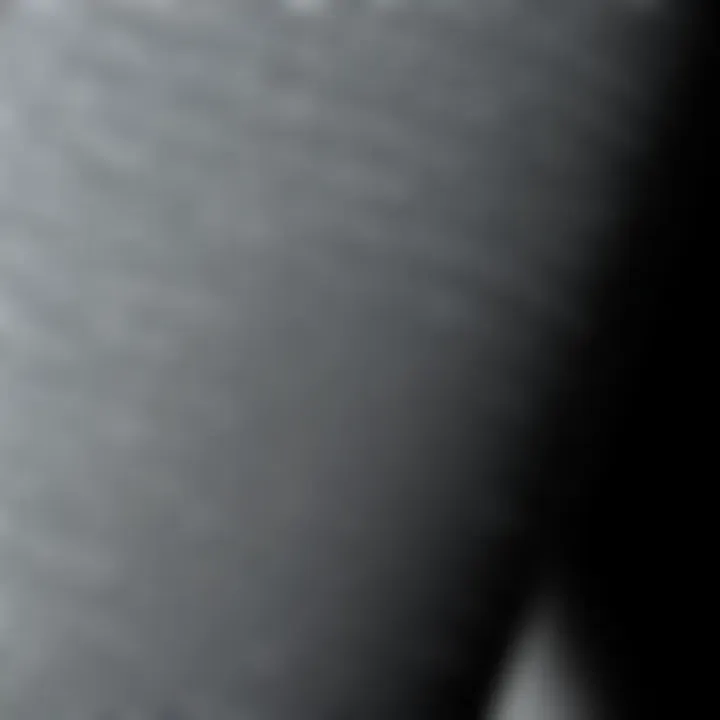 Close-up of fabric texture of grey bootcut yoga pants