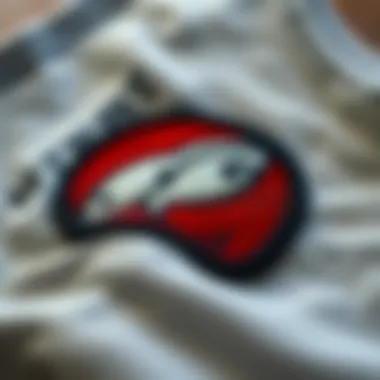 Detailed application technique for iron-on vinyl patches on fabric