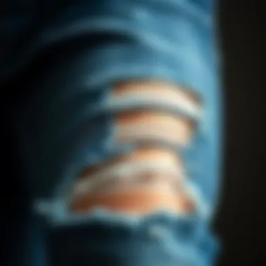 Close-up of ripped detailing on skinny jeans