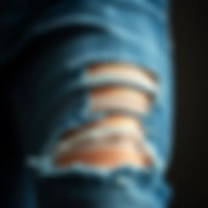 Close-up of ripped detailing on skinny jeans