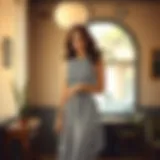 Elegant black and white striped dress on a model in a chic setting