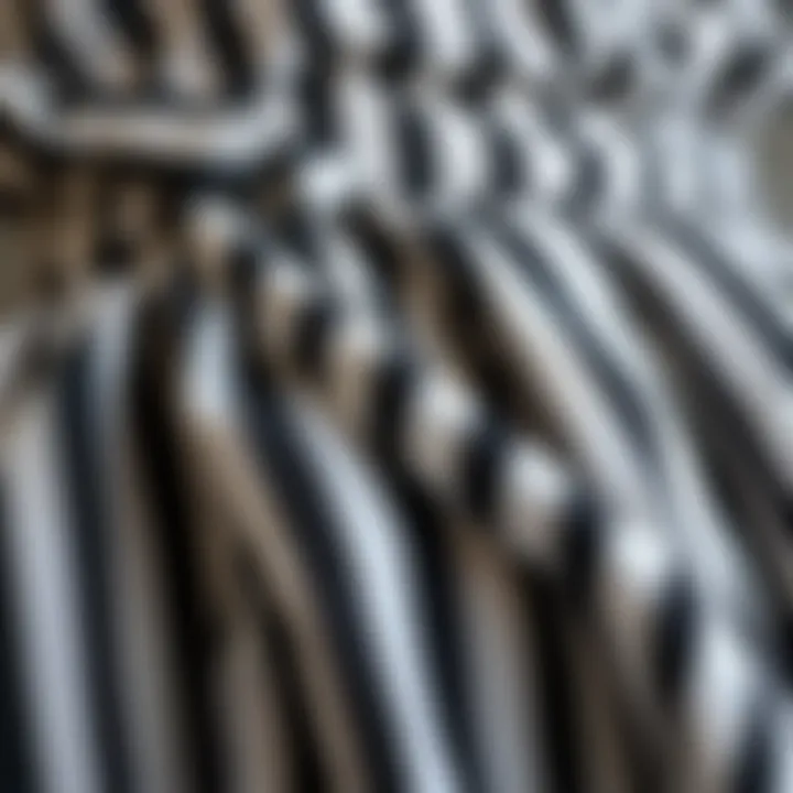 Close-up of fabric textures of a black and white striped dress