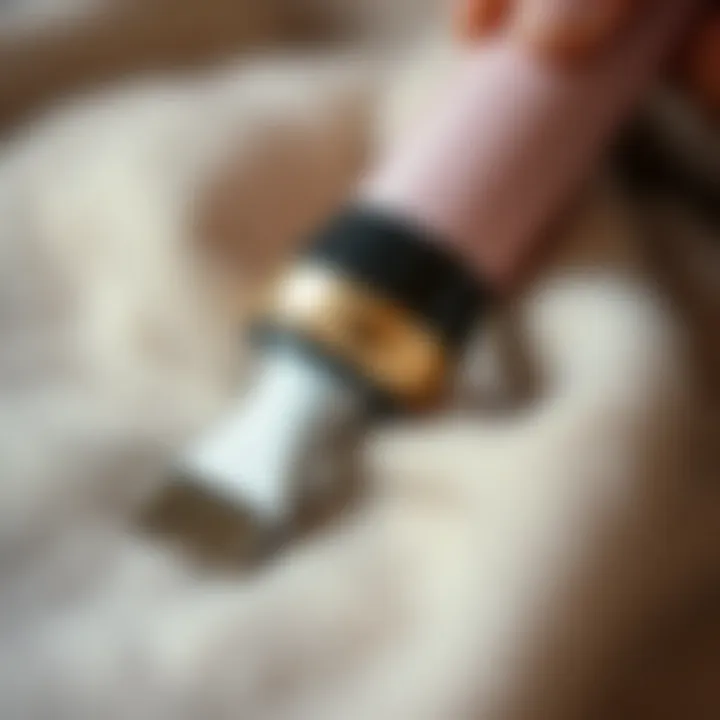 Reviving Cashmere with a Fabric Shaver Close-up of a fabric shaver in action on cashmere fabric