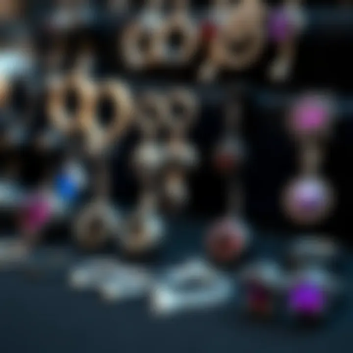 Artistic Display of Goth Belly Button Rings Collection A collection of various goth belly button rings displayed artistically.