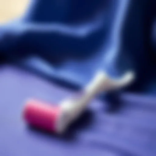 A stylish hair remover roller on a fabric background