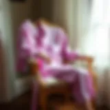Luxurious light purple silk pajamas draped elegantly on a vintage chair