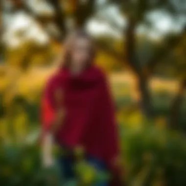 A serene outdoor scene featuring a model wearing a cape wrap shawl