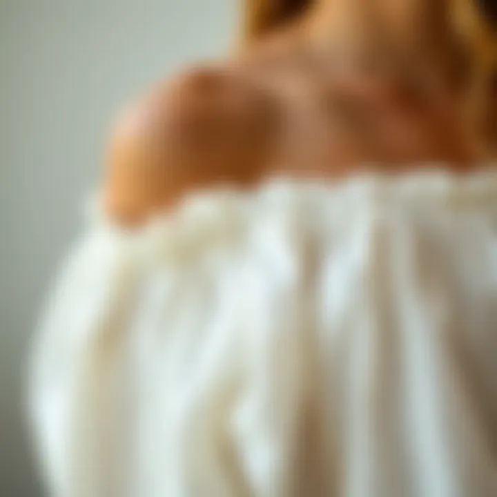 Close-Up of the Fabric Texture Close-up of the fabric texture of a white off the shoulder peasant blouse, showcasing its quality